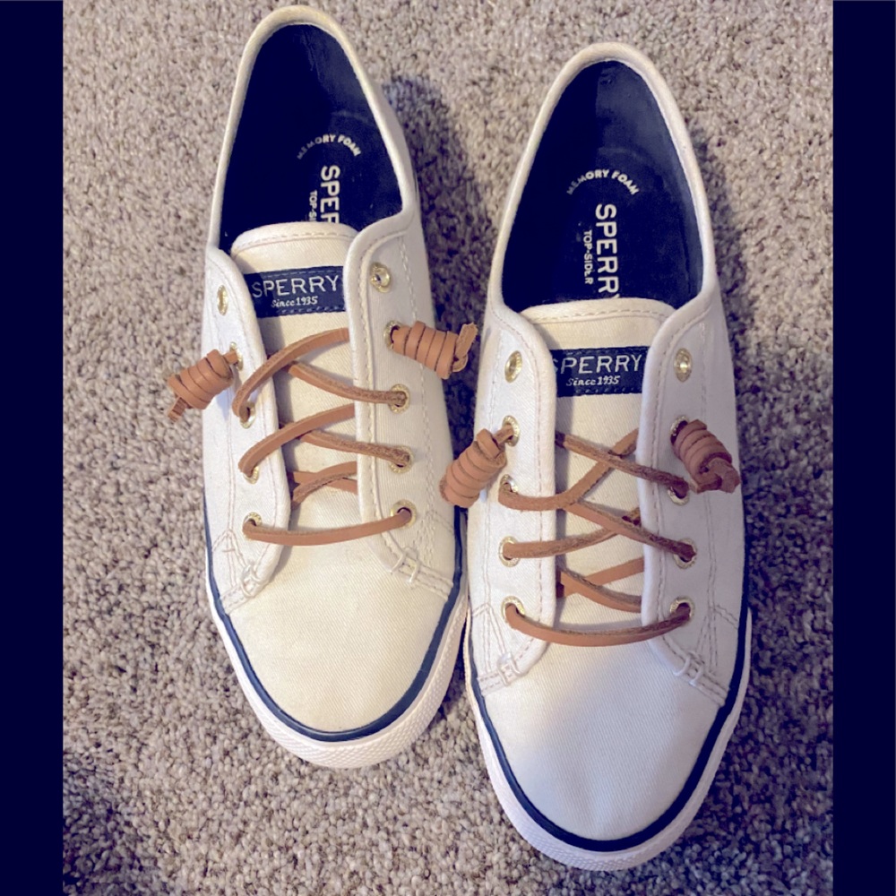 Sperry slip on shoes.